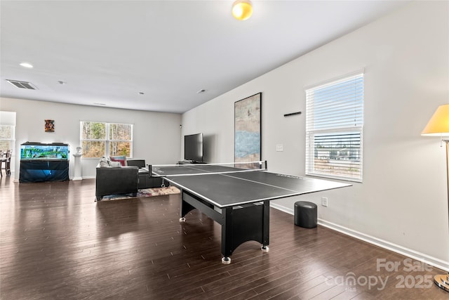 playroom with visible vents, baseboards, and wood finished floors