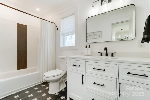 bathroom with vanity, toilet, and shower / bath combo with shower curtain