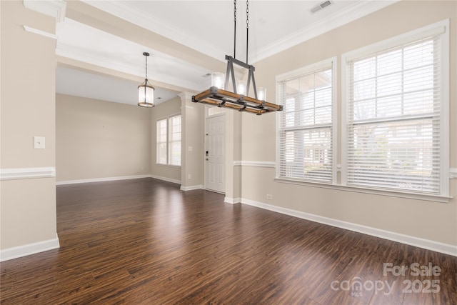 unfurnished dining area featuring crown molding, dark wood-style flooring, visible vents, and baseboards