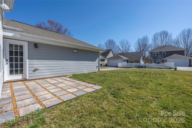 view of yard featuring a patio area and fence