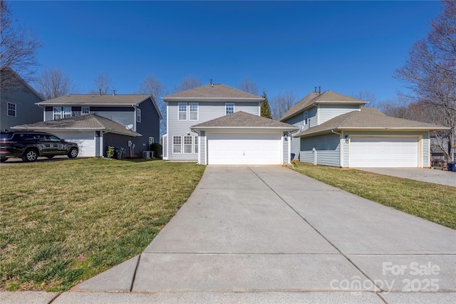 traditional-style house featuring an attached garage, central AC unit, a front lawn, and concrete driveway