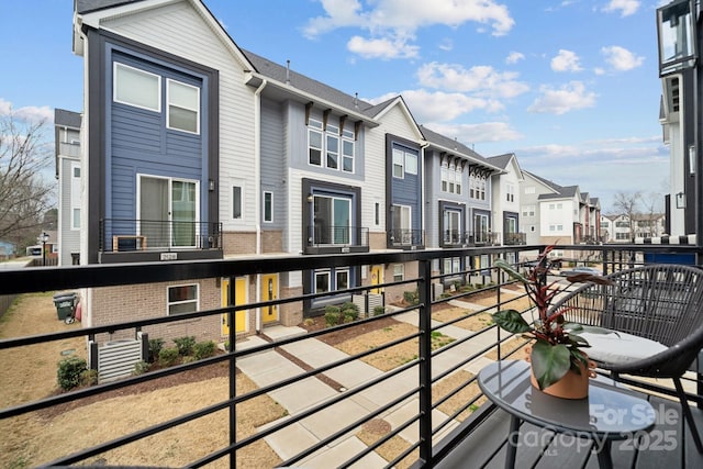 balcony featuring a residential view