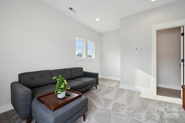 carpeted living room with recessed lighting, visible vents, and baseboards