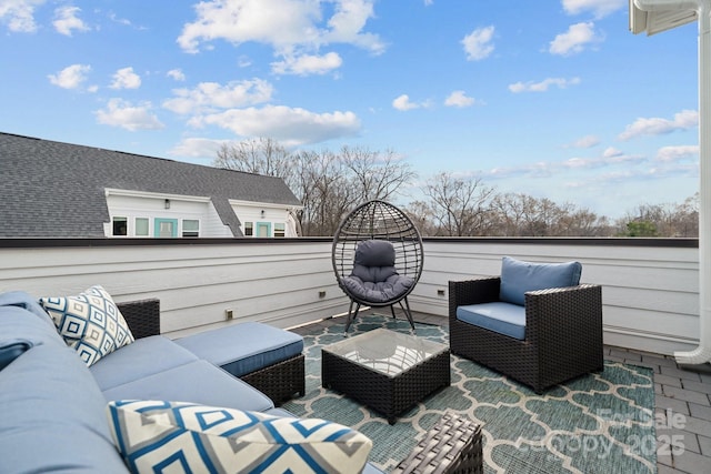 view of patio / terrace with a balcony and an outdoor hangout area