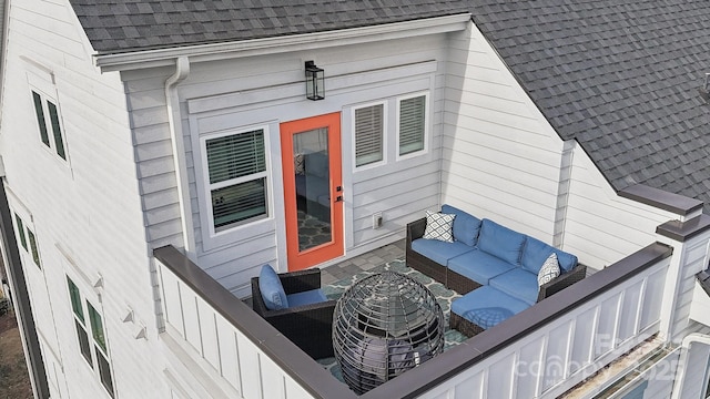 wooden terrace featuring an outdoor hangout area