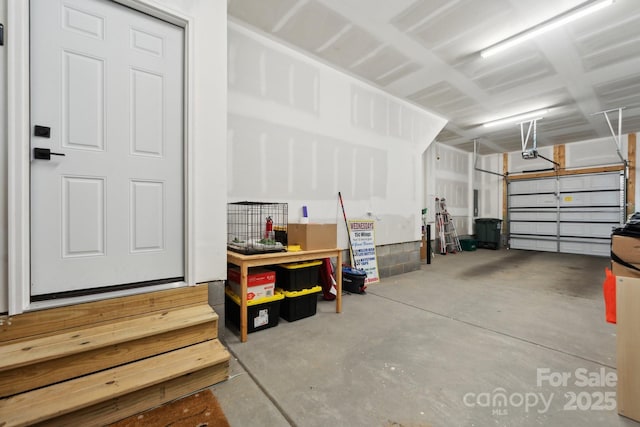 garage featuring a garage door opener