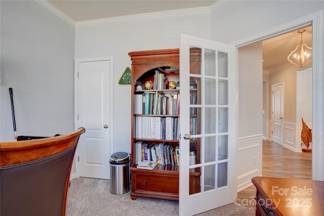 office area featuring a notable chandelier, french doors, and crown molding