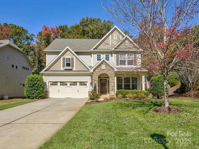 craftsman-style house with stone siding, driveway, and a front lawn