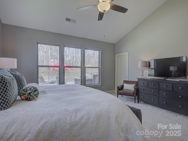 bedroom featuring high vaulted ceiling, carpet flooring, visible vents, baseboards, and a ceiling fan