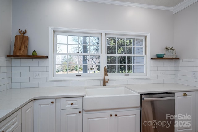 kitchen featuring open shelves, white cabinetry, dishwasher, and a sink