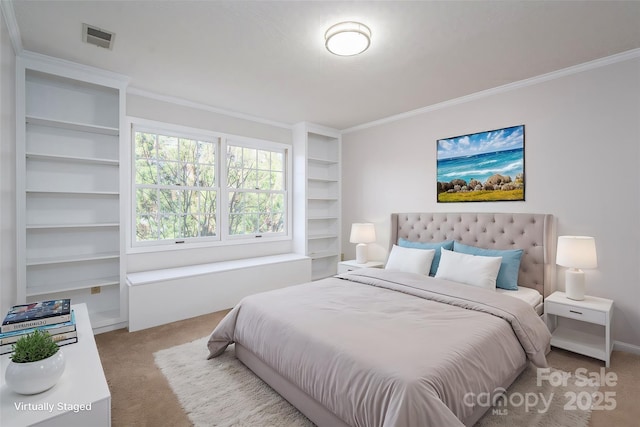 carpeted bedroom featuring crown molding and visible vents