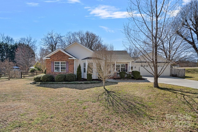 single story home featuring a garage, fence, a front lawn, and brick siding