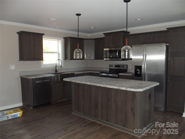 kitchen featuring appliances with stainless steel finishes, a sink, and dark brown cabinets