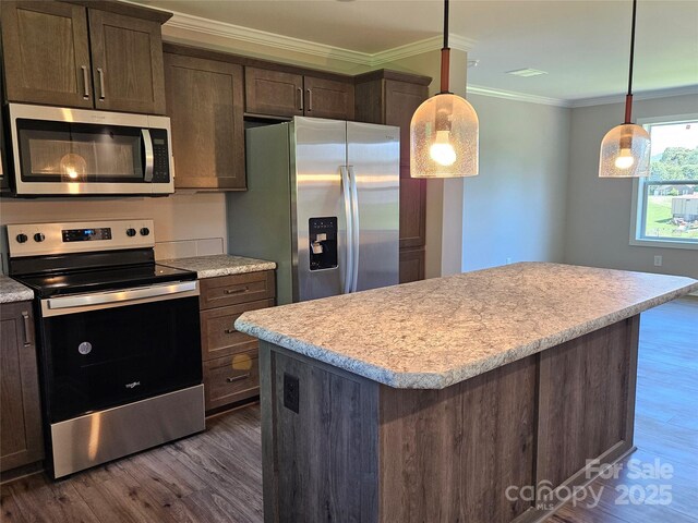 784 Severt Cir NE, Lenoir, NC 28645 - kitchen featuring stainless steel appliances, dark wood-type flooring, crown molding, light countertops, and dark brown cabinetry