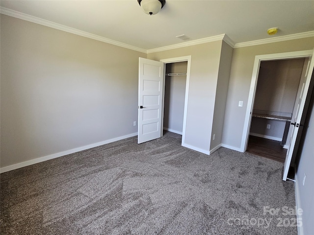 784 Severt Cir NE, Lenoir, NC 28645 - unfurnished bedroom featuring ornamental molding, dark carpet, baseboards, and a closet