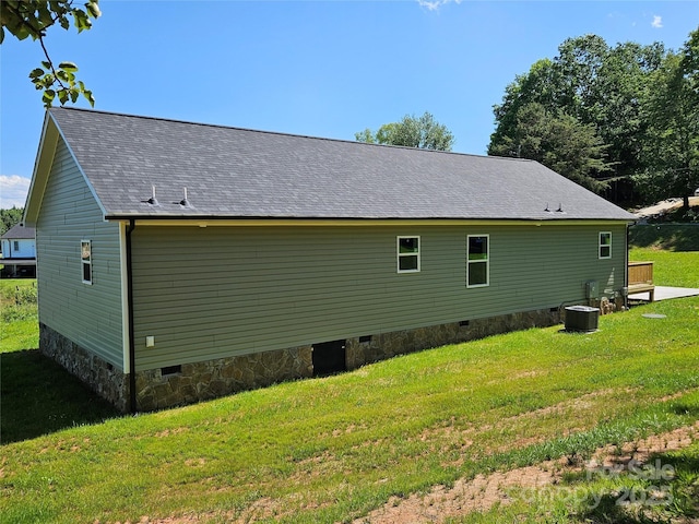 784 Severt Cir NE, Lenoir, NC 28645 - view of side of property with crawl space, a lawn, cooling unit, and a shingled roof