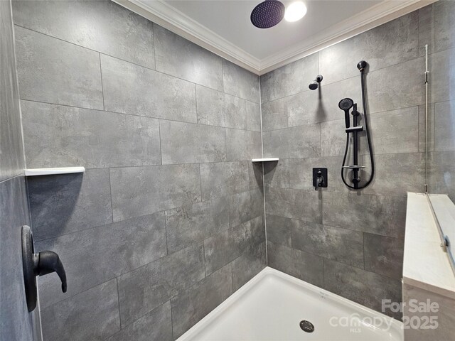 784 Severt Cir NE, Lenoir, NC 28645 - full bathroom featuring crown molding and tiled shower
