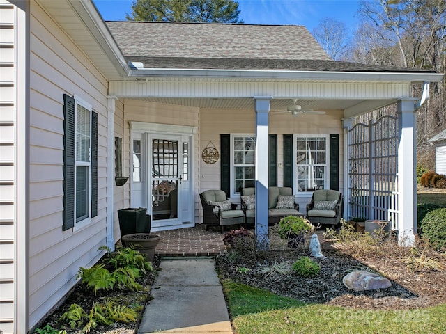 property entrance featuring covered porch and roof with shingles