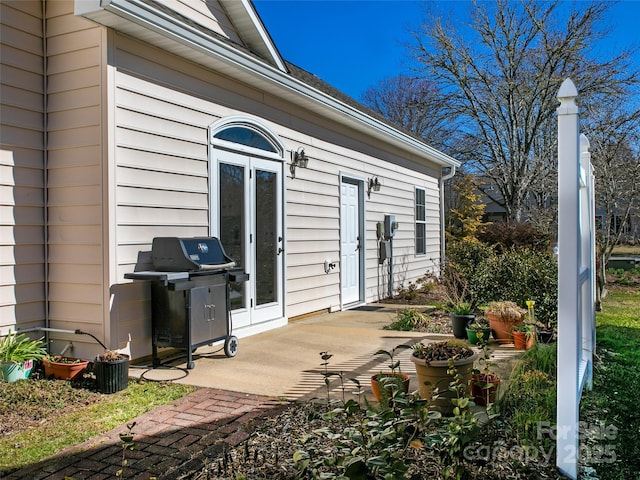 view of patio / terrace featuring french doors and grilling area