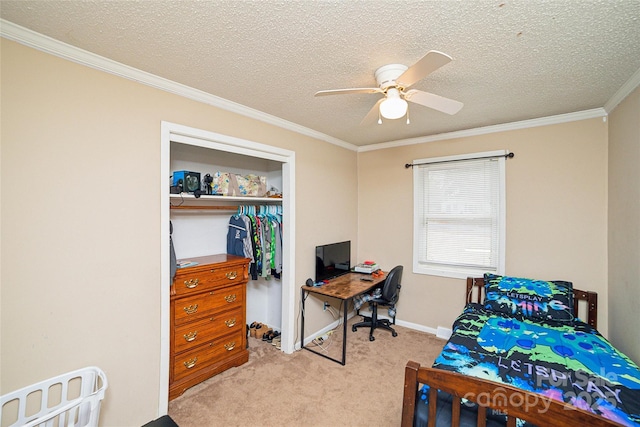 bedroom featuring light carpet, a textured ceiling, ornamental molding, and a closet