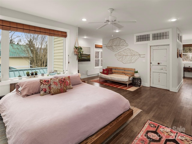 bedroom with recessed lighting, ceiling fan, baseboards, and wood finished floors