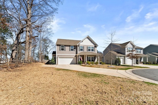 view of front of house featuring a garage, driveway, and board and batten siding