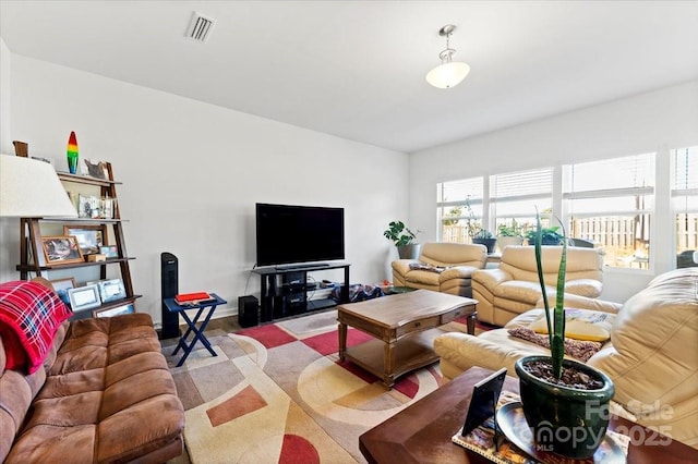 living area featuring visible vents