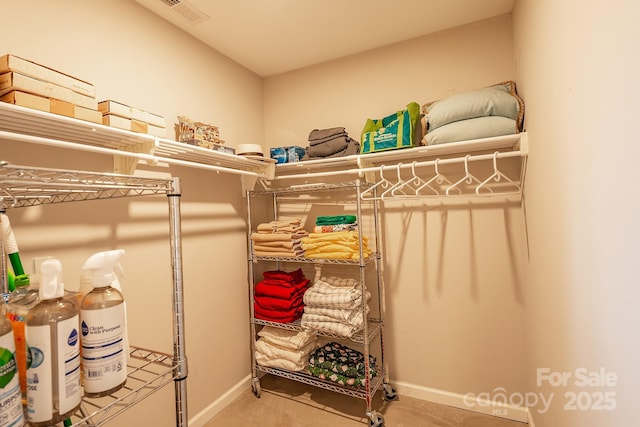 spacious closet with visible vents