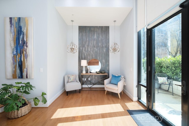 sitting room featuring wood finished floors and baseboards