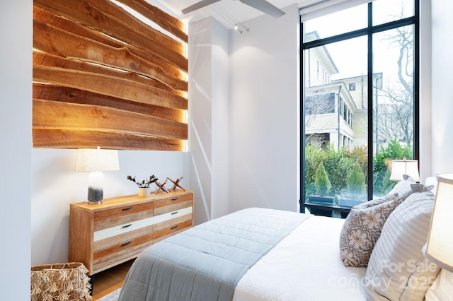 bedroom featuring dark wood-style flooring