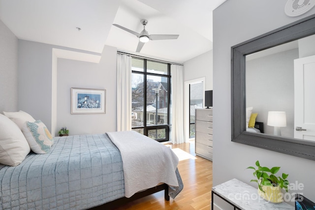 bedroom featuring light wood-type flooring and ceiling fan