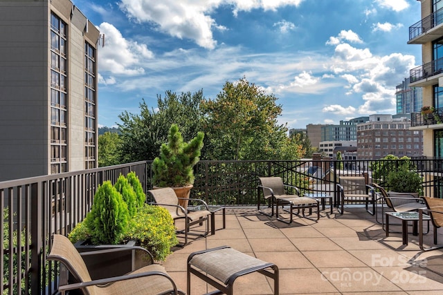 balcony featuring a view of city