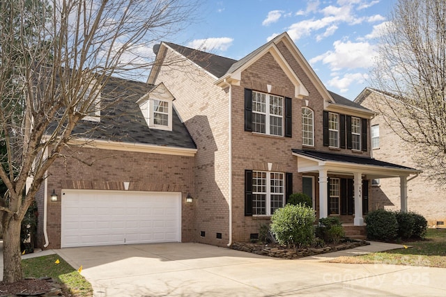 view of front of house featuring crawl space, concrete driveway, and brick siding