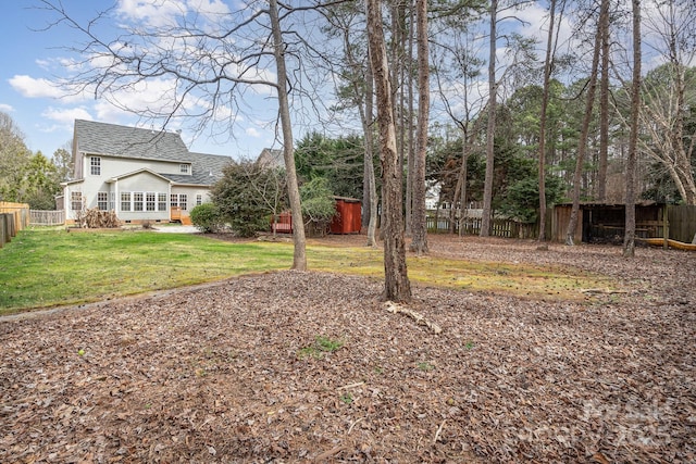 view of yard with a fenced backyard