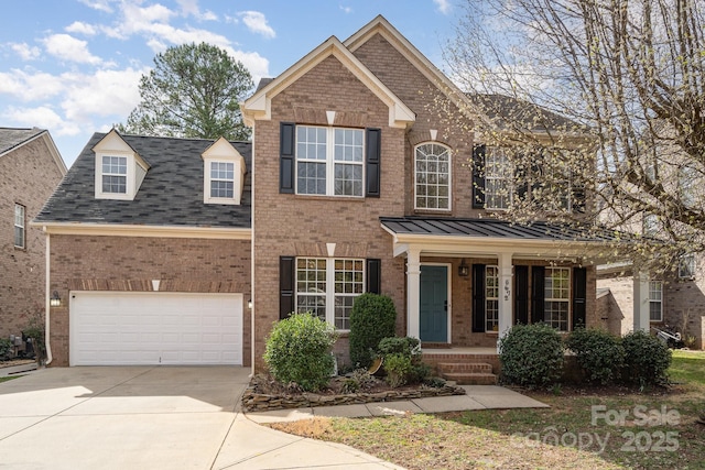 5672 Wrenfield Ct, Charlotte, NC 28277 - view of front facade featuring brick siding, concrete driveway, covered porch, and roof with shingles