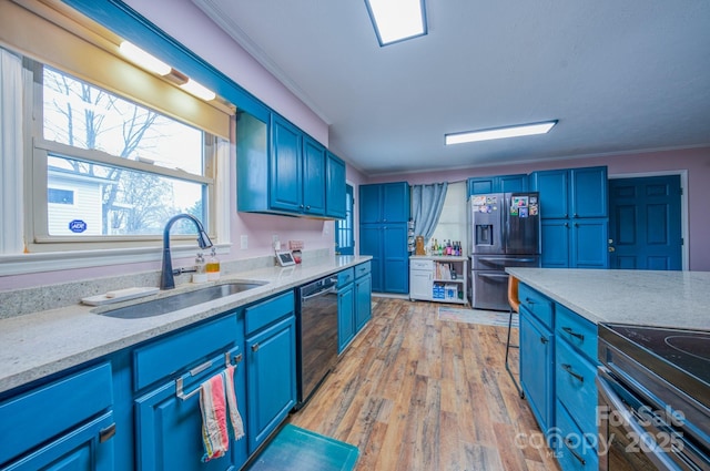 91 Congress St, Asheville, NC 28801 - kitchen featuring blue cabinets, black dishwasher, a sink, and stainless steel fridge with ice dispenser
