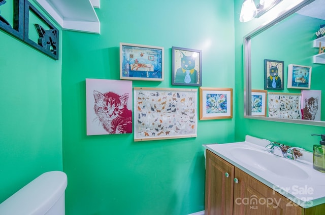 91 Congress St, Asheville, NC 28801 - half bath featuring vanity and toilet