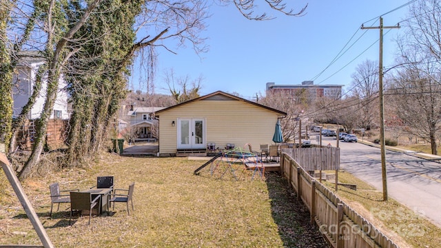 91 Congress St, Asheville, NC 28801 - rear view of property with a yard, french doors, and fence private yard