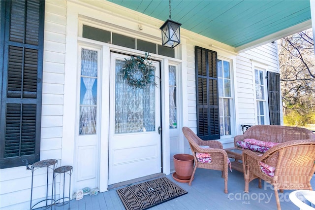 entrance to property with a porch