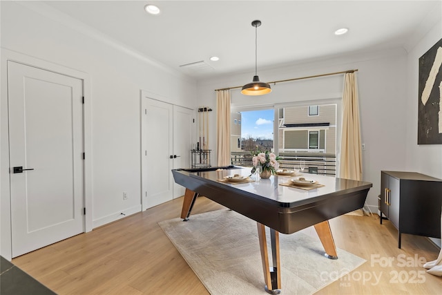 interior space featuring baseboards, recessed lighting, and light wood-style floors