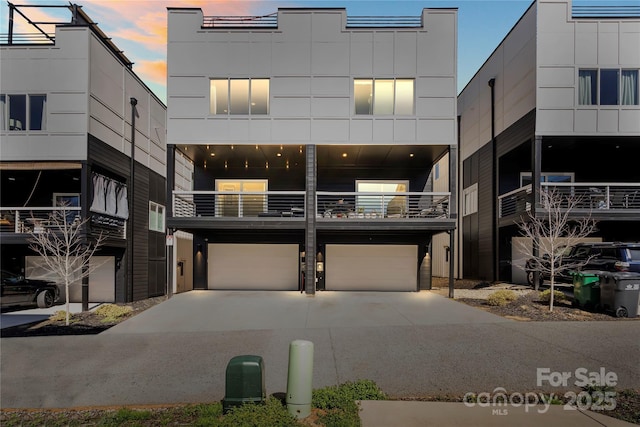 exterior space featuring a garage and driveway