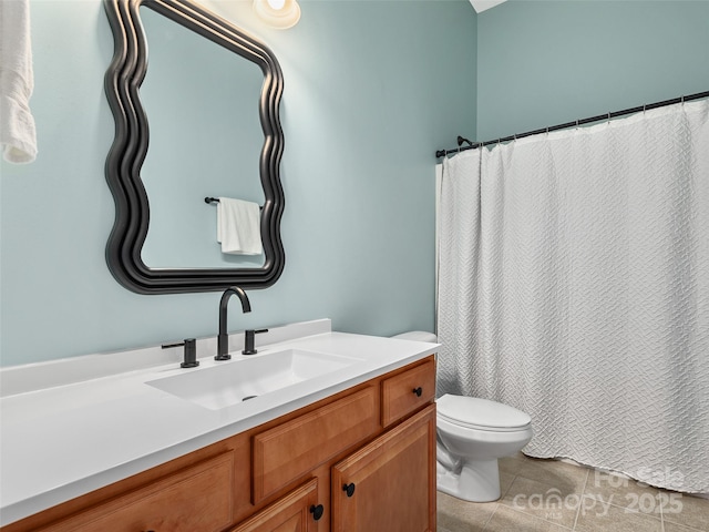 bathroom featuring toilet, curtained shower, tile patterned flooring, and vanity