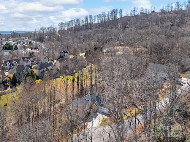 bird's eye view featuring a view of trees