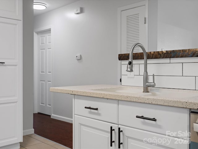 bathroom with vanity and tile patterned floors