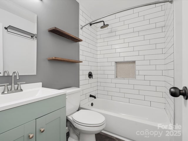 full bath featuring  shower combination, vanity, and toilet