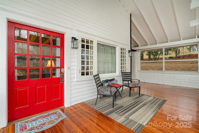 wooden terrace with covered porch