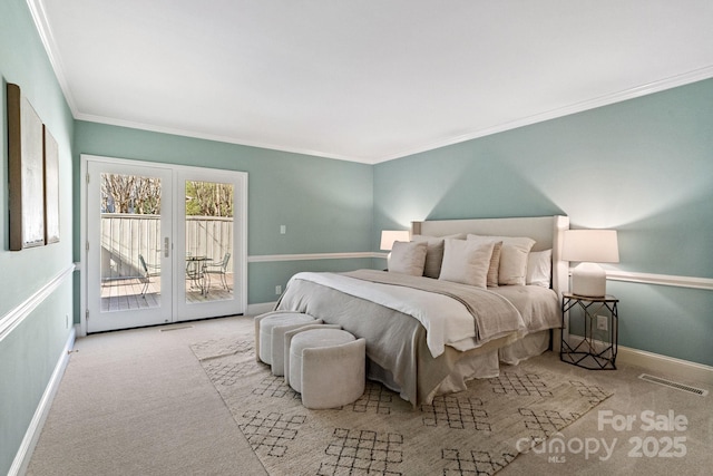 carpeted bedroom featuring visible vents, baseboards, access to outside, crown molding, and french doors