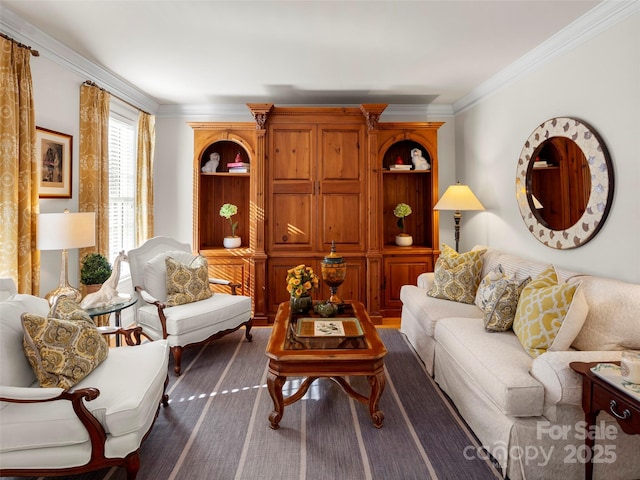 sitting room featuring ornamental molding