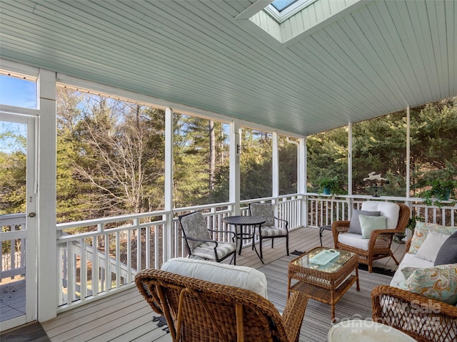 sunroom featuring a skylight