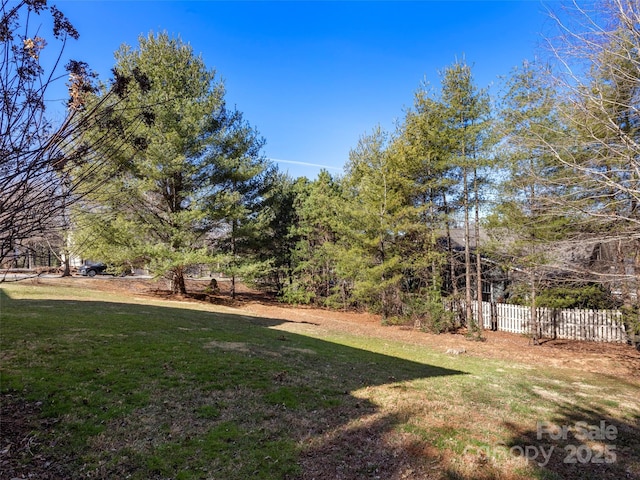 view of yard featuring fence